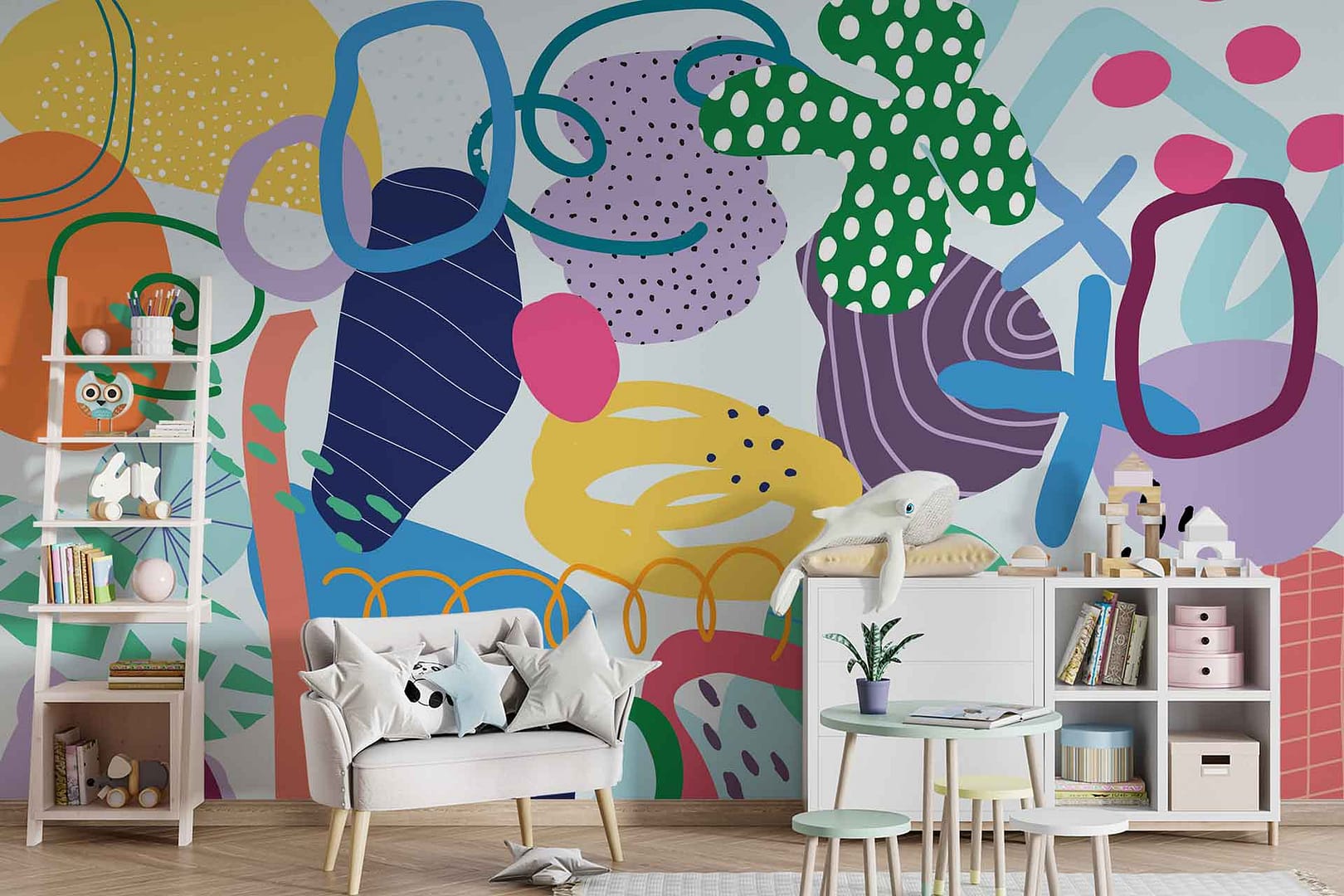 Freestyle - a wallpaper made up of various graphic shapes in bright colours by Cara Saven Wall Design