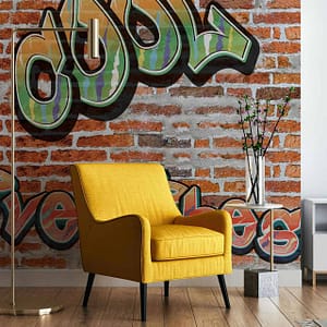 Camden Town - a wallpaper with graffiti words on a grunge brick background by Cara Saven Wall Design
